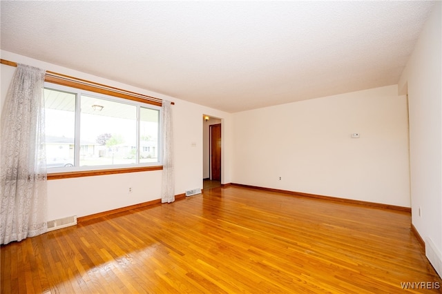 4314 Elmwood Ave, Hamburg, NY 14219 - unfurnished room with light wood-style floors and baseboards
