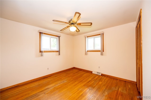 4314 Elmwood Ave, Hamburg, NY 14219 - empty room featuring plenty of natural light, baseboards, light wood-style floors, and a ceiling fan