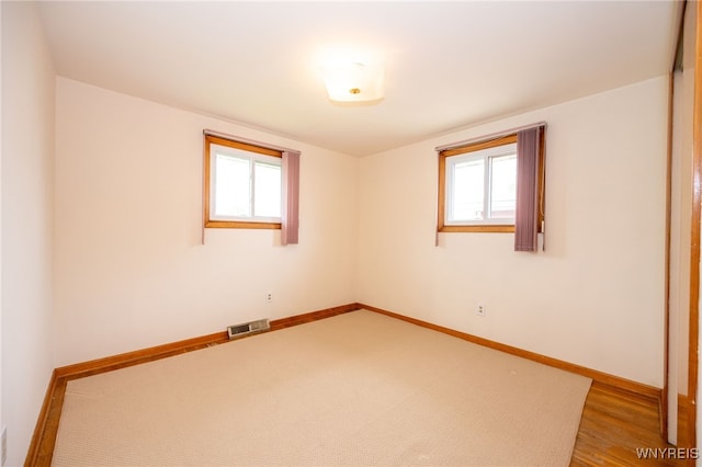 4314 Elmwood Ave, Hamburg, NY 14219 - empty room with healthy amount of natural light and baseboards