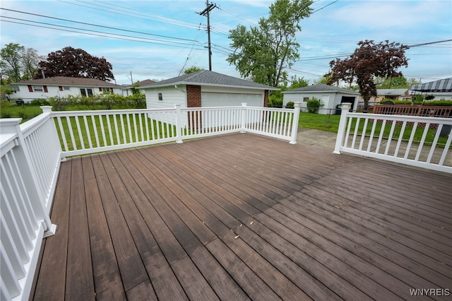 4314 Elmwood Ave, Hamburg, NY 14219 - wooden terrace featuring an outdoor structure, a yard, and a garage
