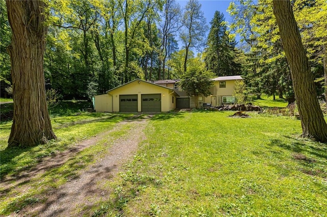 182 Stony Point Trl, Webster, NY 14580 - view of grassy yard with driveway and a garage