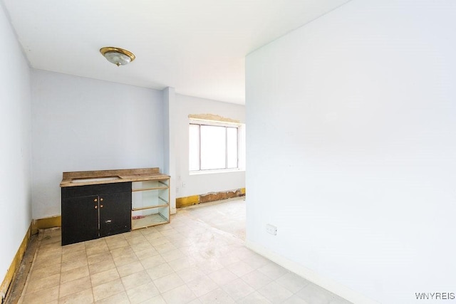 628 9th St, Niagara Falls, NY 14301 - spare room with baseboards