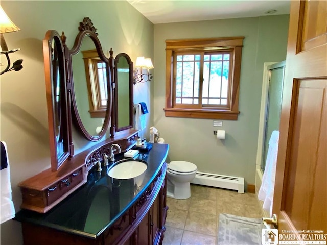 6753 Poverty Hill Rd, Ellicottville, NY 14731 - full bathroom featuring a baseboard heating unit, vanity, toilet, and tile patterned floors