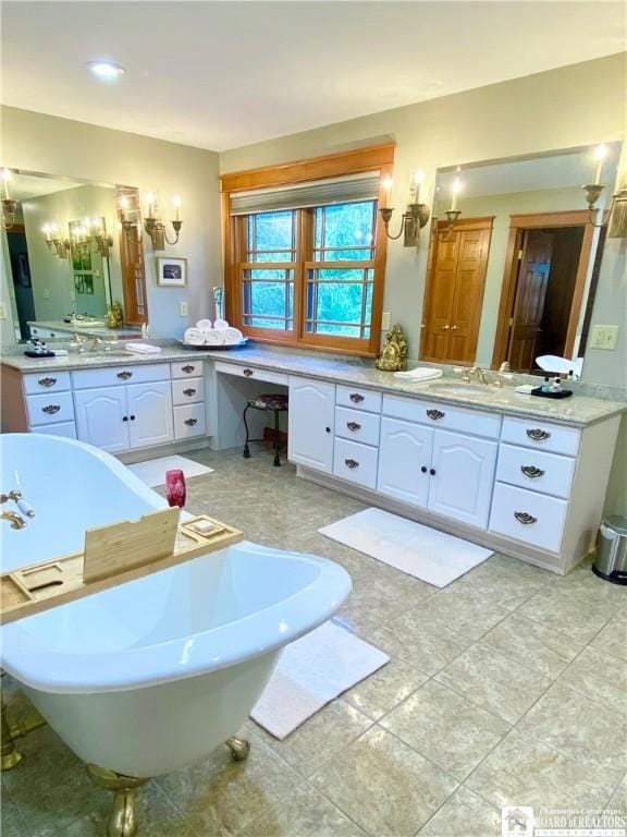 6753 Poverty Hill Rd, Ellicottville, NY 14731 - bathroom with a freestanding tub, vanity, and tile patterned flooring