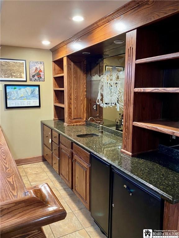 6753 Poverty Hill Rd, Ellicottville, NY 14731 - bar with a sink, light tile patterned floors, and baseboards
