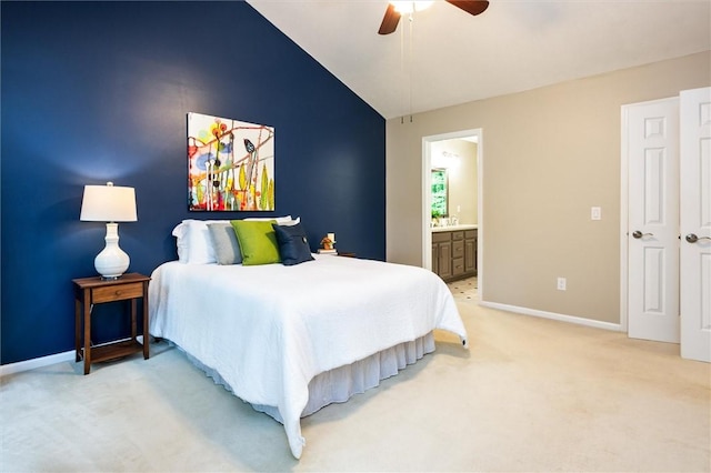 169 Watson Rd, Penfield, NY 14450 - bedroom with vaulted ceiling, baseboards, light colored carpet, ceiling fan, and ensuite bath