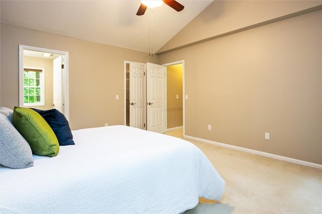 169 Watson Rd, Penfield, NY 14450 - bedroom with light carpet, baseboards, vaulted ceiling, and a ceiling fan
