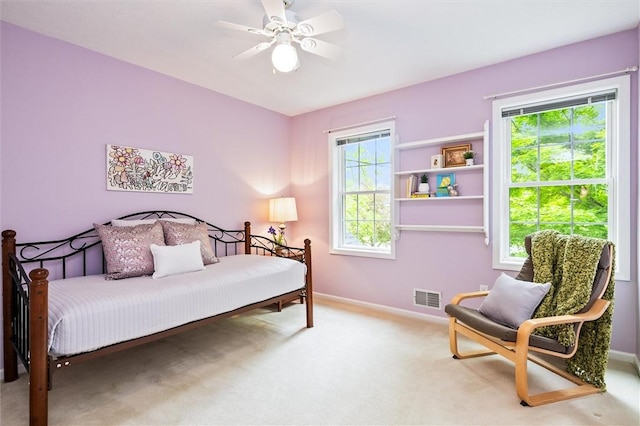 169 Watson Rd, Penfield, NY 14450 - carpeted bedroom with baseboards and a ceiling fan