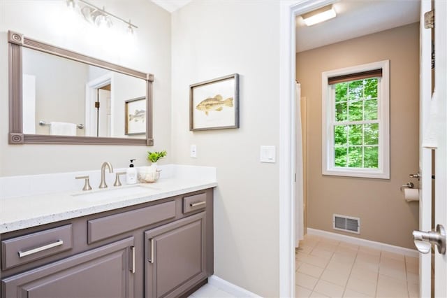 169 Watson Rd, Penfield, NY 14450 - full bathroom with vanity, tile patterned floors, and baseboards
