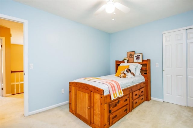 169 Watson Rd, Penfield, NY 14450 - bedroom with light colored carpet, baseboards, and a ceiling fan