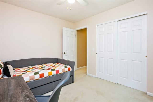 169 Watson Rd, Penfield, NY 14450 - bedroom featuring light colored carpet, baseboards, a closet, and ceiling fan