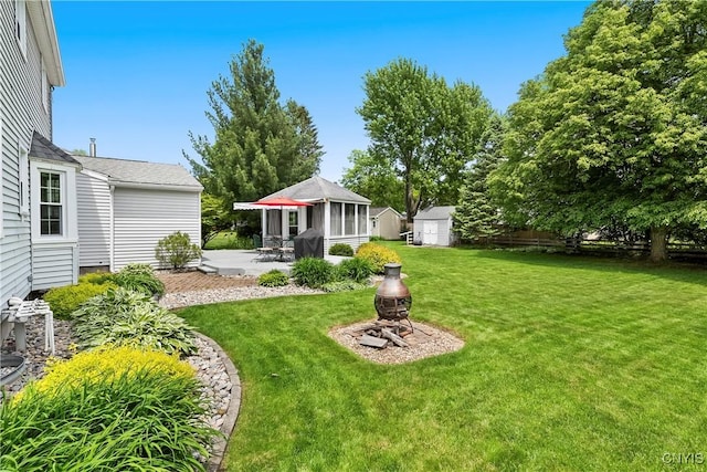 8260 Dexter Pkwy, Lysander, NY 13027 - view of grassy yard featuring a patio