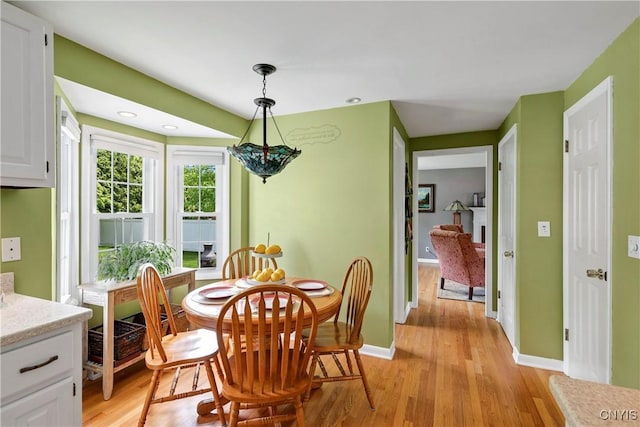 8260 Dexter Pkwy, Lysander, NY 13027 - dining space featuring light wood-style flooring, baseboards, and recessed lighting