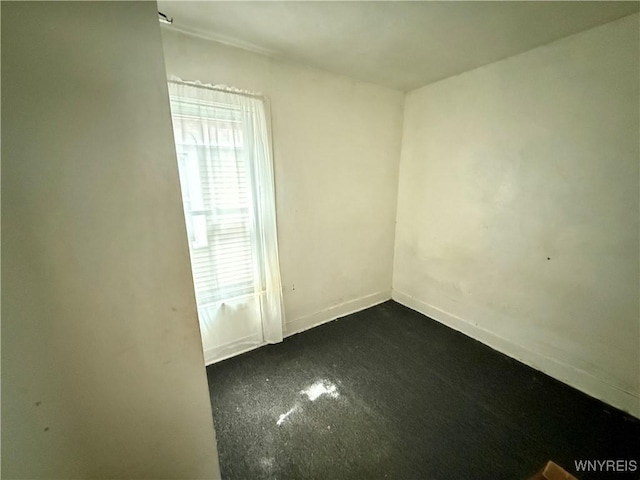 114 19th St, Buffalo, NY 14213 - unfurnished room with baseboards and dark carpet
