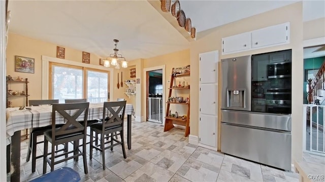 801 W Thomas St, Rome-Inside, NY 13440 - dining space with a chandelier and baseboards