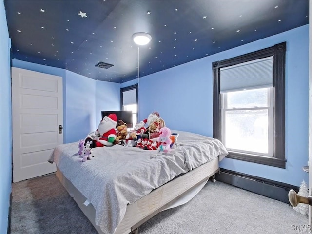 801 W Thomas St, Rome-Inside, NY 13440 - bedroom with carpet floors and baseboard heating