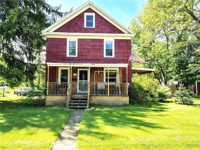 801 W Thomas St, Rome-Inside, NY 13440 - view of front of house with a porch and a front lawn