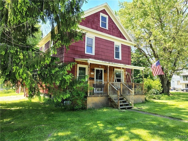 801 W Thomas St, Rome-Inside, NY 13440 - view of front of home featuring a porch and a front lawn