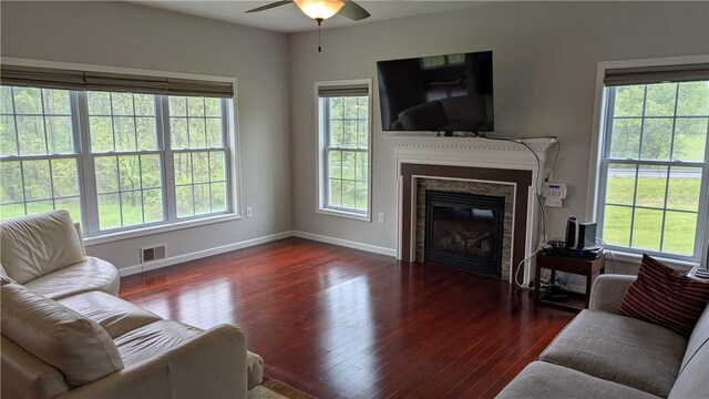 12 Probst Rd, Mendon, NY 14534 - living room featuring a ceiling fan, wood-type flooring, and plenty of natural light
