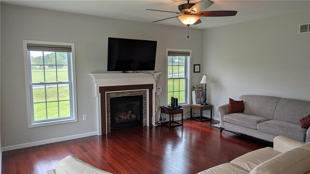 12 Probst Rd, Mendon, NY 14534 - living room featuring a ceiling fan, wood finished floors, and a fireplace