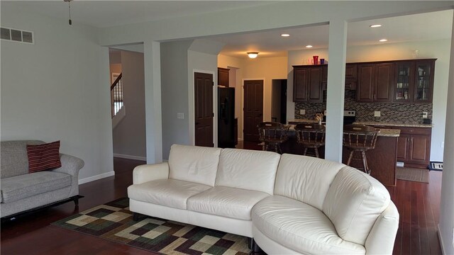 12 Probst Rd, Mendon, NY 14534 - living area with stairway, recessed lighting, and dark wood-style floors
