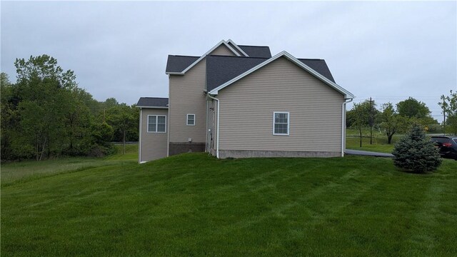 12 Probst Rd, Mendon, NY 14534 - rear view of house with a lawn