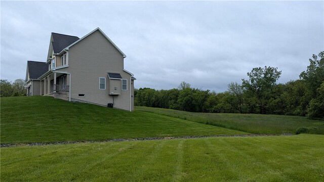 12 Probst Rd, Mendon, NY 14534 - view of home's exterior featuring a lawn