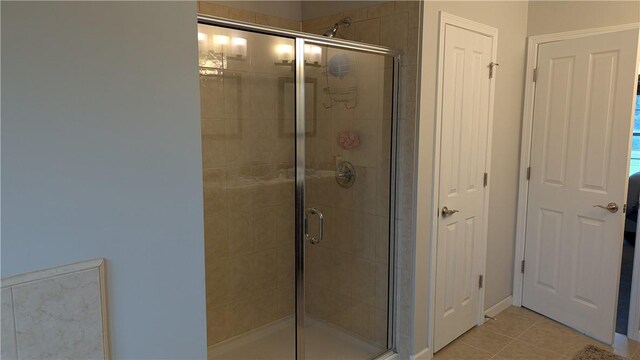 12 Probst Rd, Mendon, NY 14534 - full bath with a stall shower and tile patterned floors