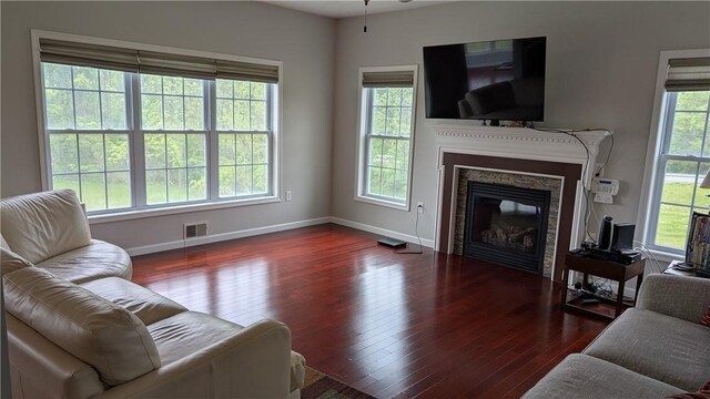 12 Probst Rd, Mendon, NY 14534 - living room with wood-type flooring and a glass covered fireplace