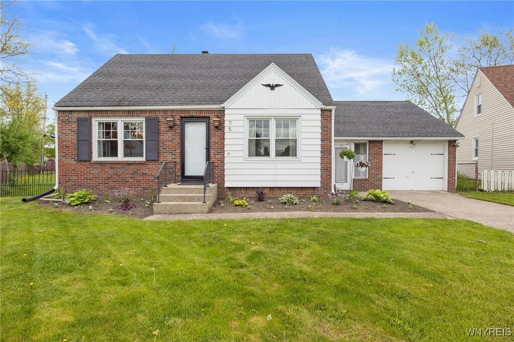 75 Meaford Rd, Cheektowaga, NY 14215 - view of front of property featuring driveway, brick siding, an attached garage, and a shingled roof