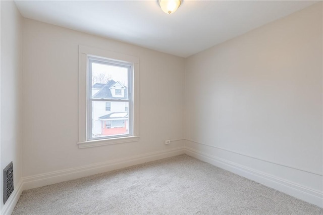 7 Herbert St, Rochester, NY 14621 - carpeted spare room featuring baseboards