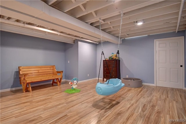 4580 Carlyes Ct, Hamburg, NY 14075 - playroom featuring baseboards and wood finished floors