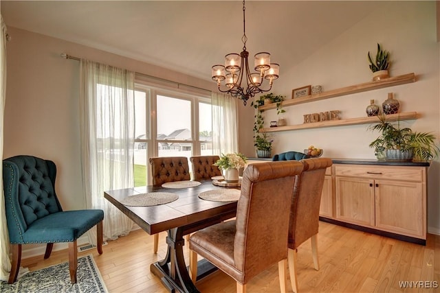 4580 Carlyes Ct, Hamburg, NY 14075 - dining room with a chandelier and light wood-style flooring