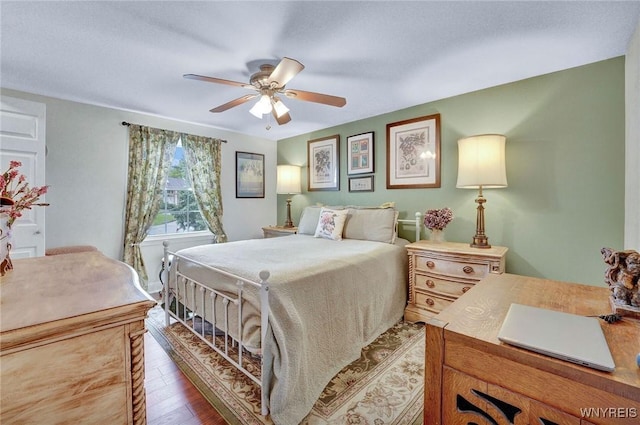 270 Buffalo Rd Unit 72, Aurora, NY 14052 - bedroom featuring wood finished floors and a ceiling fan