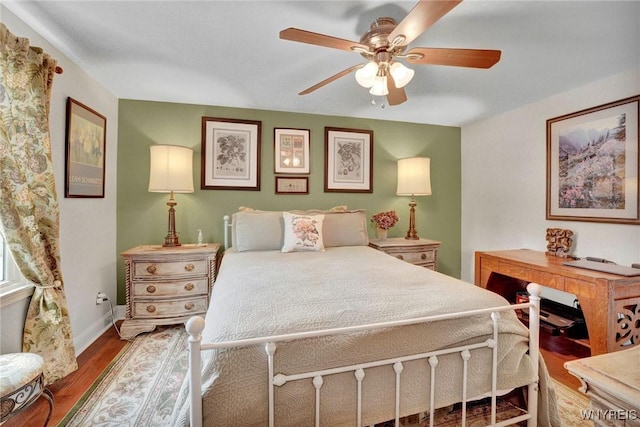 270 Buffalo Rd Unit 72, Aurora, NY 14052 - bedroom with wood finished floors, baseboards, and ceiling fan