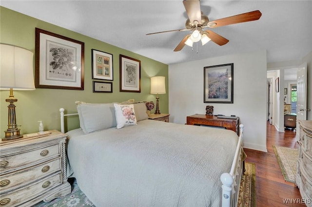 270 Buffalo Rd Unit 72, Aurora, NY 14052 - bedroom featuring dark wood finished floors, baseboards, and a ceiling fan