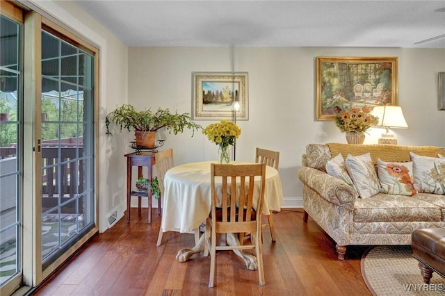 270 Buffalo Rd Unit 72, Aurora, NY 14052 - dining space featuring wood-type flooring and baseboards