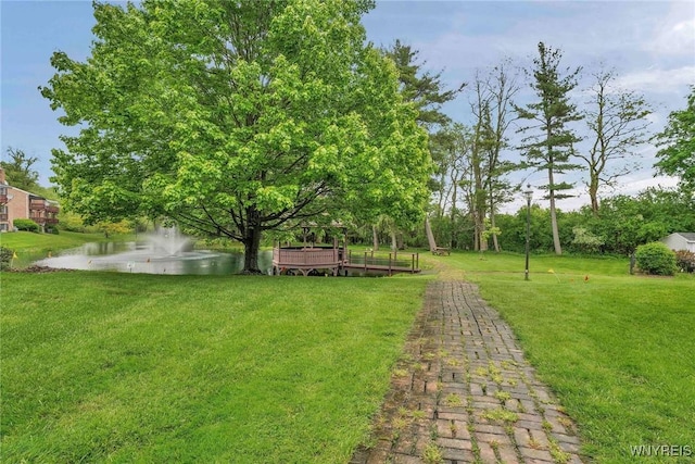 270 Buffalo Rd Unit 72, Aurora, NY 14052 - view of green lawn with a water view