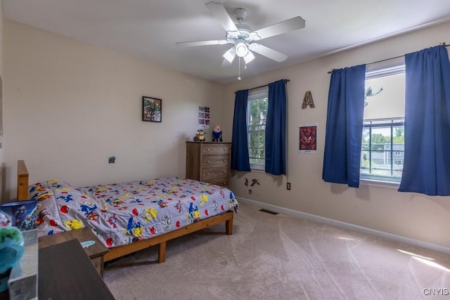 3 Foxwood Dr, Lysander, NY 13027 - carpeted bedroom with baseboards and ceiling fan