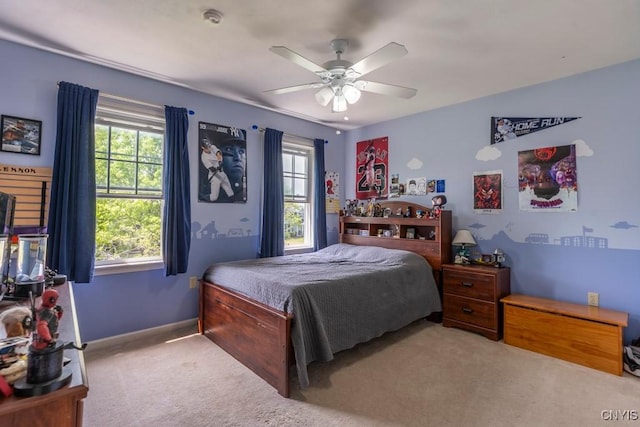 3 Foxwood Dr, Lysander, NY 13027 - carpeted bedroom featuring multiple windows, baseboards, and ceiling fan