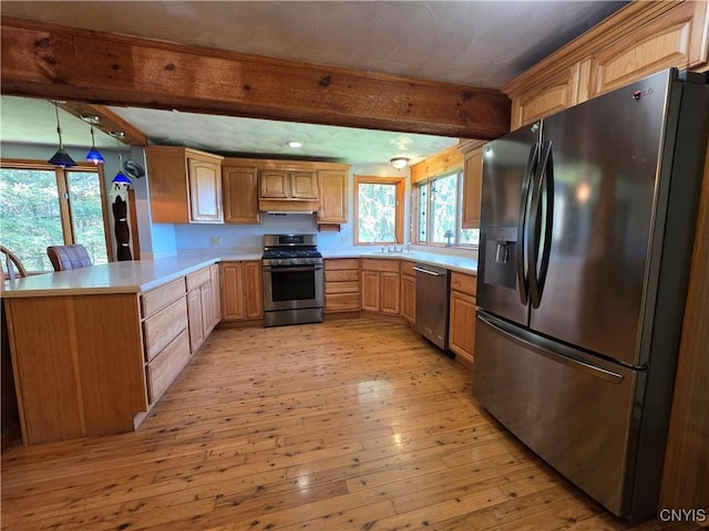 4300 Mutton Hill Rd, Fenner, NY 13035 - kitchen with stainless steel appliances, beam ceiling, a peninsula, light countertops, and light wood-style flooring
