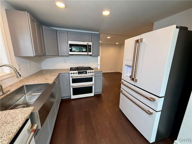 58 Van Ness Rd S, Van Buren, NY 13027 - kitchen featuring premium appliances, gray cabinets, dark wood finished floors, and recessed lighting