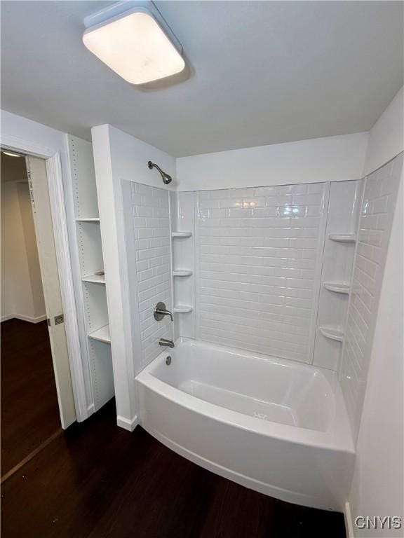 58 Van Ness Rd S, Van Buren, NY 13027 - bathroom with wood finished floors and bathing tub / shower combination