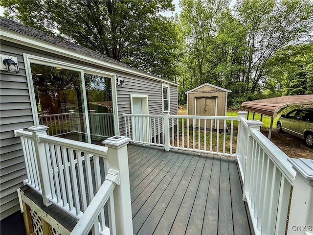 58 Van Ness Rd S, Van Buren, NY 13027 - wooden terrace featuring a storage unit and view of wooded area