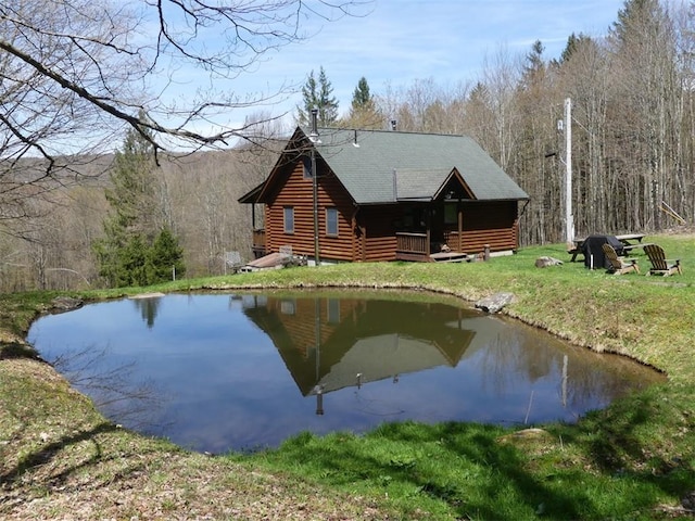 1910 Davis Hollow Rd, Andes, NY 13731 - rear view of house with a wooded view, a yard, a water view, and log exterior