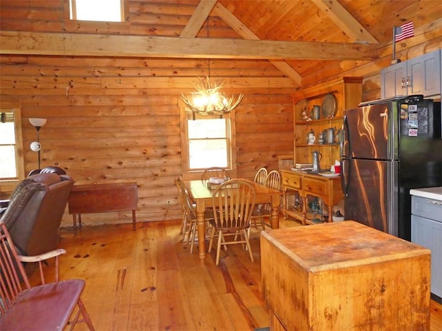 1910 Davis Hollow Rd, Andes, NY 13731 - kitchen with freestanding refrigerator, light wood-style floors, a chandelier, wooden ceiling, and pendant lighting