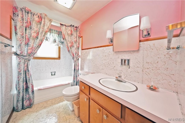 12620 Rte 39, Sardinia, NY 14134 - bathroom featuring vanity, toilet, shower / bathtub combination with curtain, and tile walls