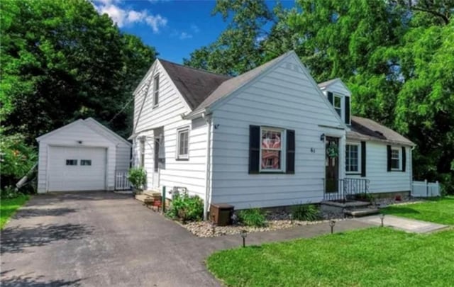 61 Tamarack, Irondequoit, NY 14622 - bungalow-style home with an outdoor structure, asphalt driveway, a garage, and a front yard