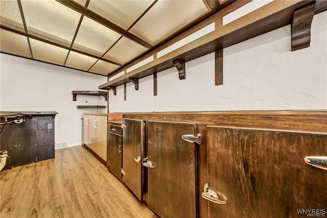 3045 Niagara St, Niagara Falls, NY 14303 - kitchen with open shelves, light wood-style floors, and dark brown cabinets