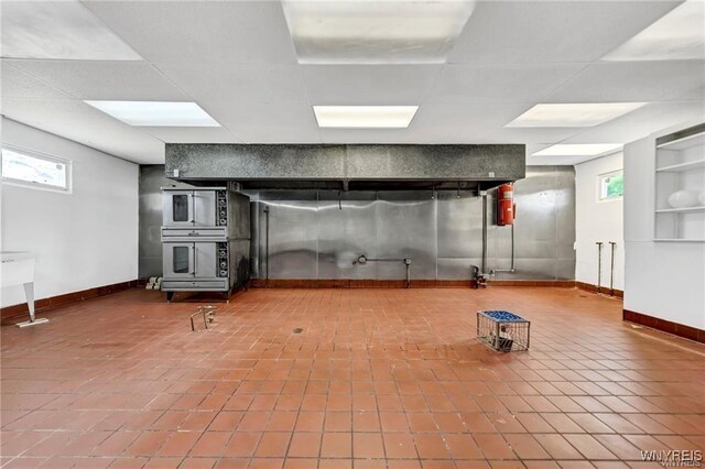 3045 Niagara St, Niagara Falls, NY 14303 - basement featuring baseboards and tile patterned floors